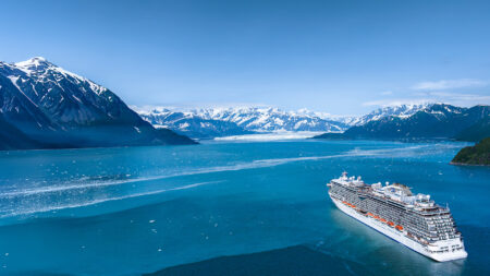 A Princess Cruises ship sails through an Alaskan channel surrounded by glaciers in this undated marketing image meant to promote the company's 2028 Alaska sailing season. (Princess Cruises)